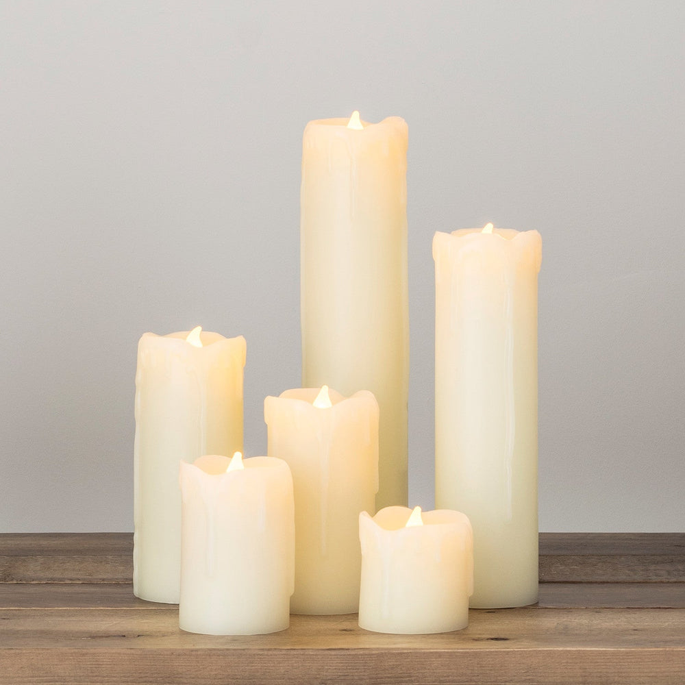 CA13851_Battery-Operated-Wax-LED-Pillar-Candles-Wooden-Table-Close_P1.jpg