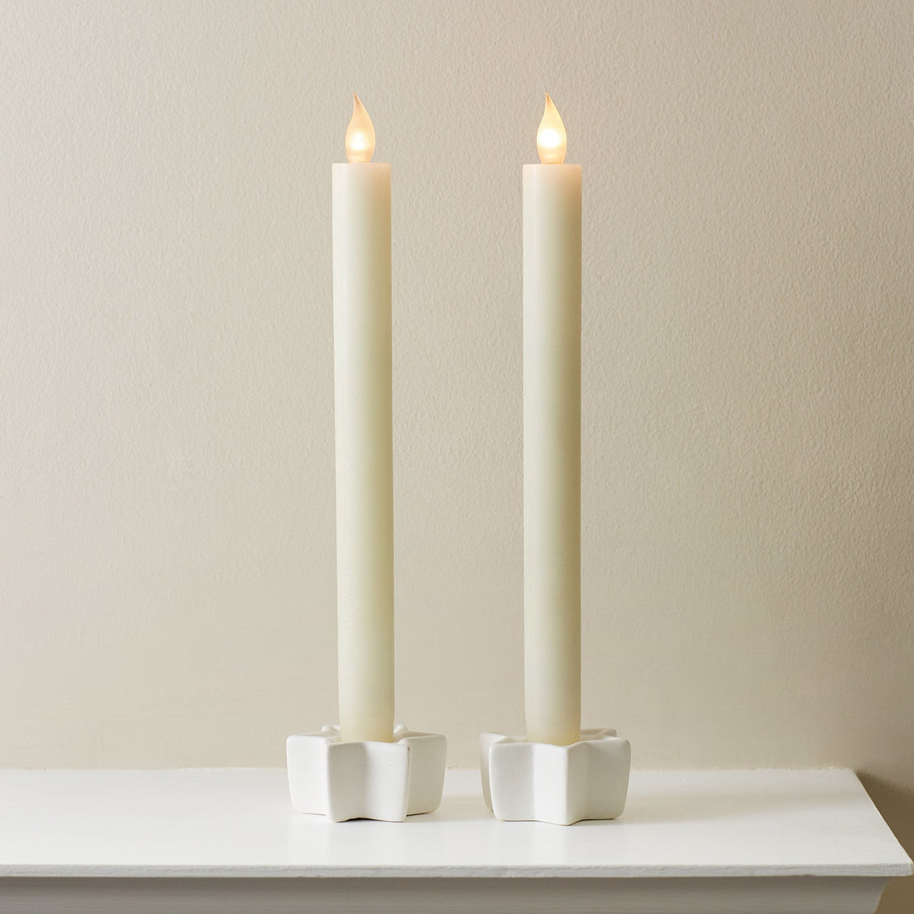 CA18006_2-Ivory-LED-Taper-Candles-Close-1_P1.jpg