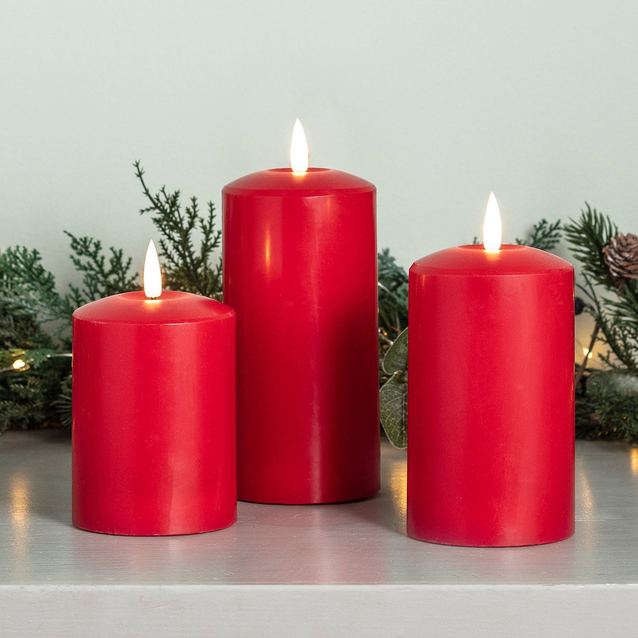 CA19003_True-Glow-TruGlow-3-Red-Pillar-Candles-Christmas-Close_P2.jpg