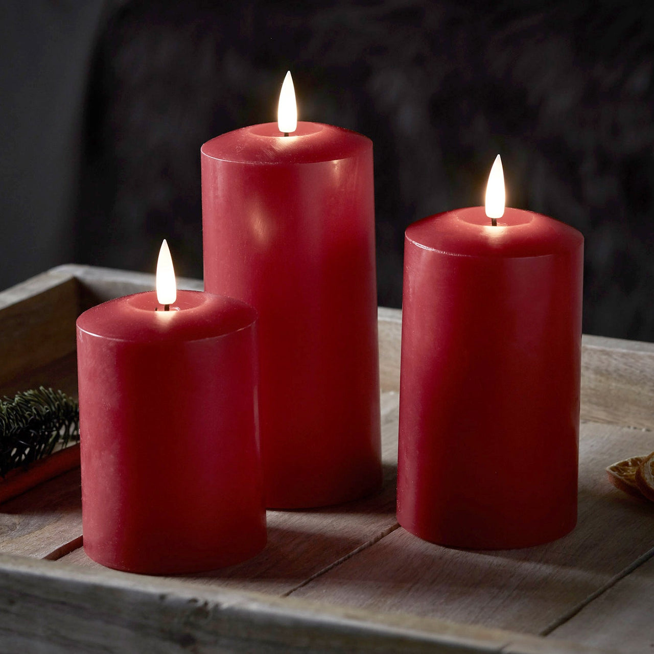 CA19003_True-Glow-TruGlow-3-Red-Pillar-Candles-Close_P1.jpg