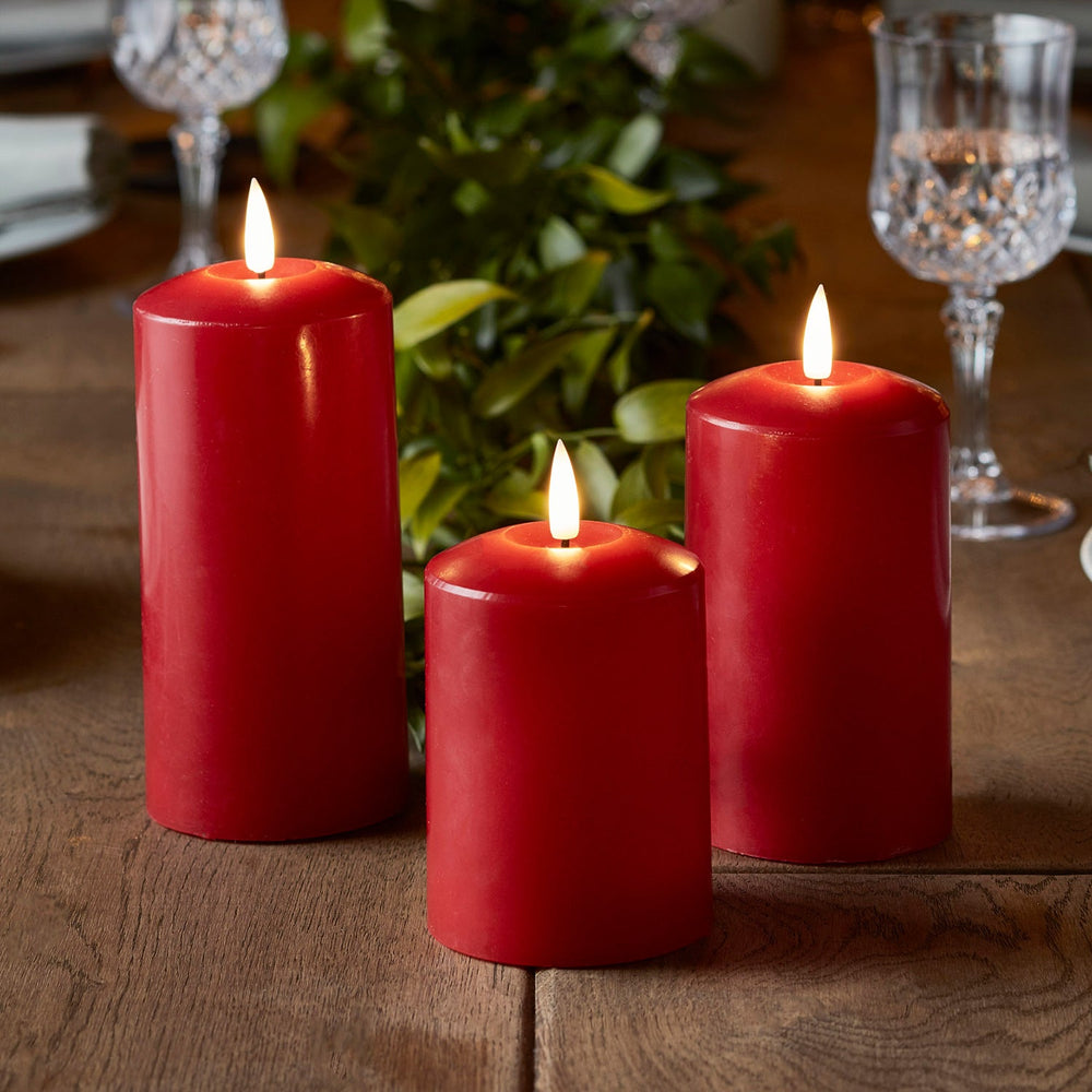 CA19003_True-Glow-TruGlow-3-Red-Pillar-Candles-Table_P3.jpg