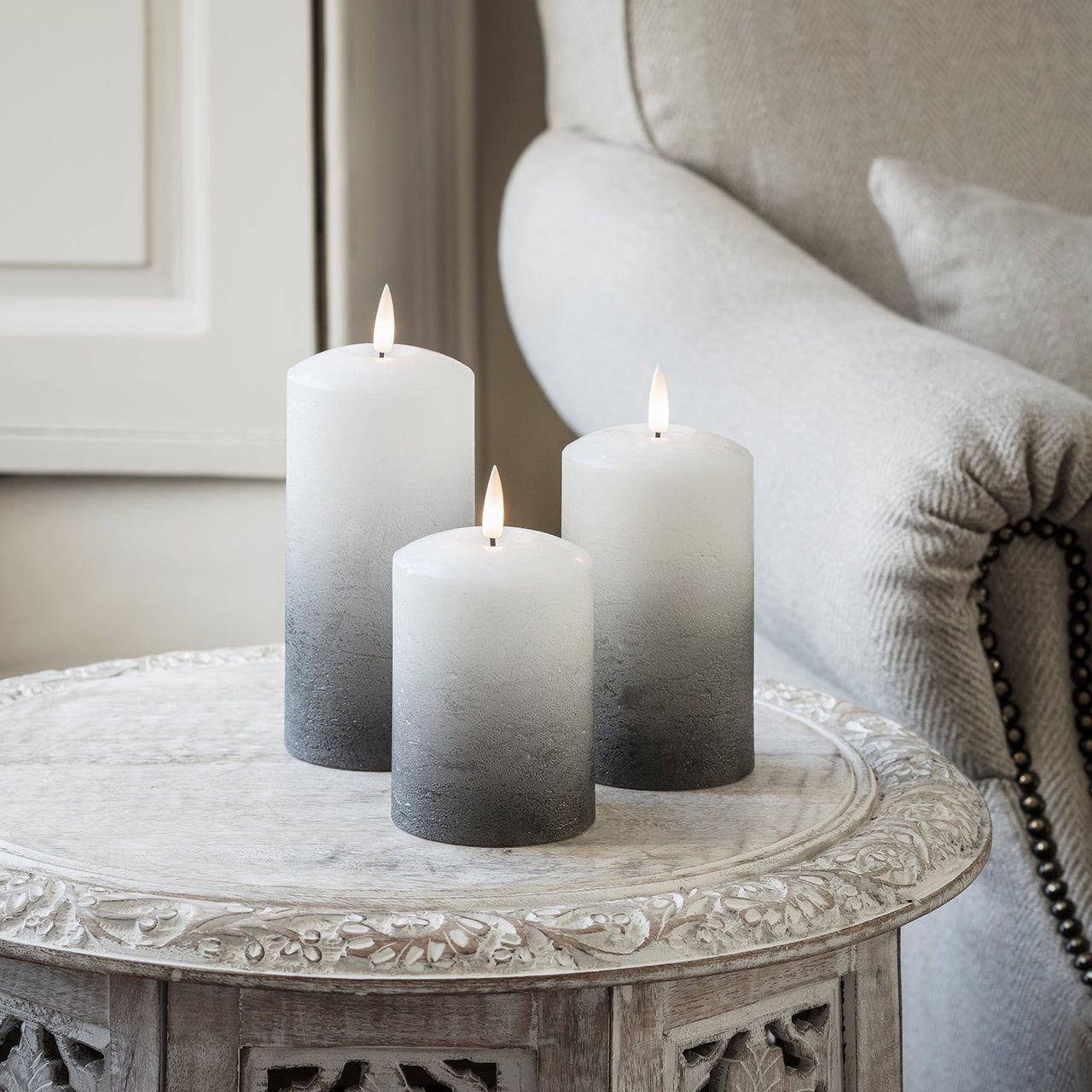 CA19004_True-Glow-TruGlow-3-Grey-Ombre-Pillar-Candles-Table_P.jpg