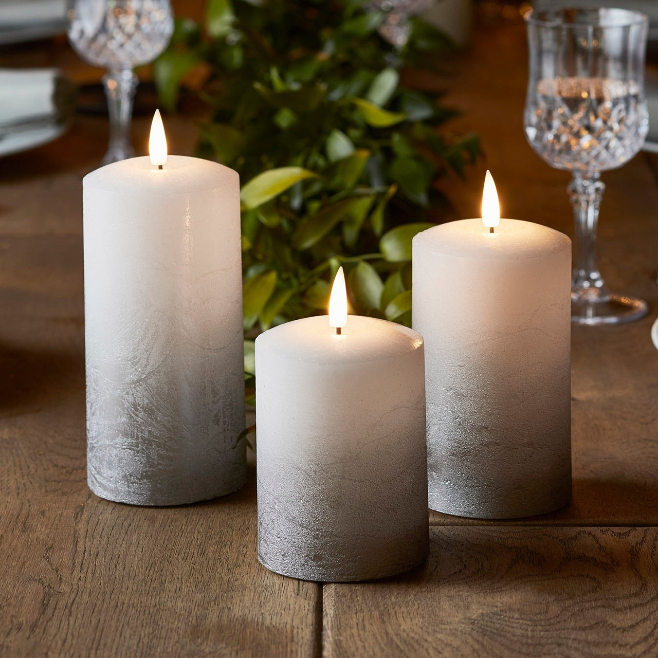 CA19004_True-Glow-TruGlow-3-Grey-Ombre-Pillar-Candles-Table_P2.jpg