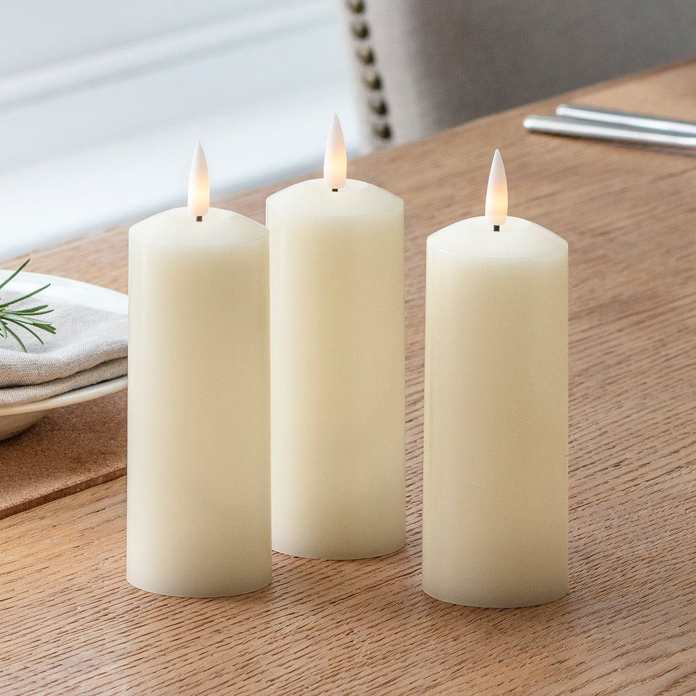 CA19006_3-True-Glow-TruGlow-Skinny-Pillar-Candles-Close_P1_4228719b-e81f-4100-a0c0-70f60c1b2c26.jpg