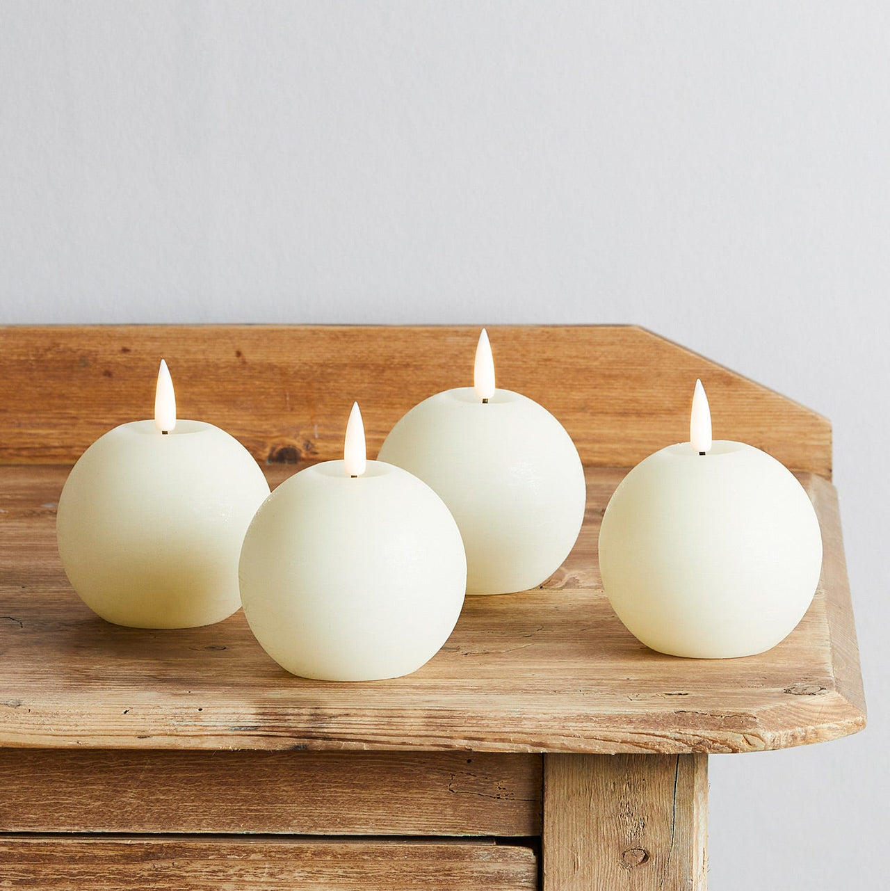 CA20027_2_4-Ivory-Truglow-Ball-LED-Candles-Indoor-Table.jpg