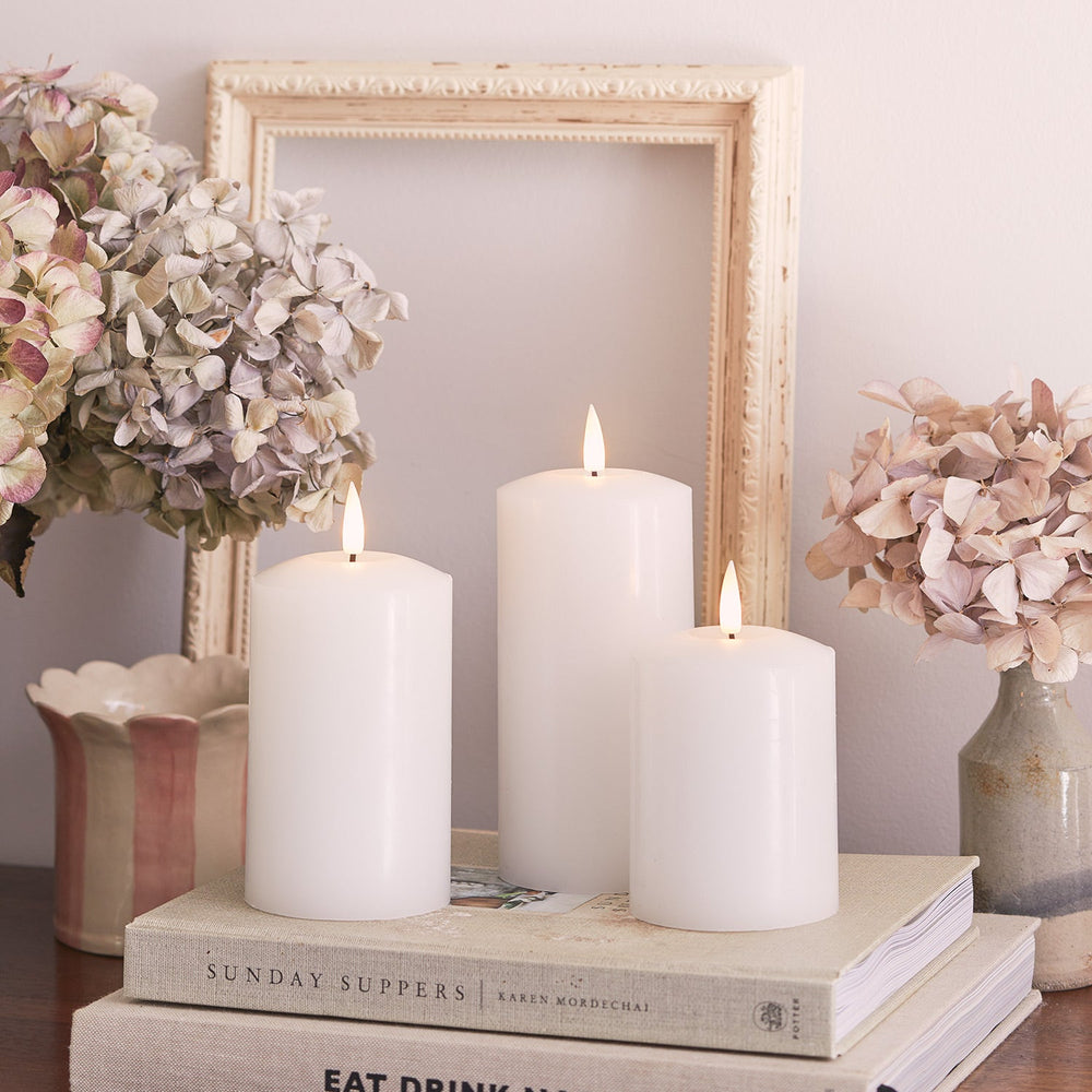 CA20037_truglow-white-led-pillar-candle-books.jpg