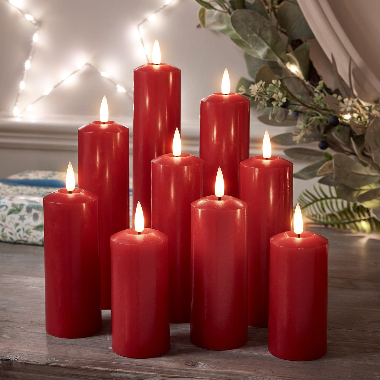 CA21033RC_9-TruGlow-Red-LED-Slim-Pillar-Candles-Festive-Sideboard.jpg