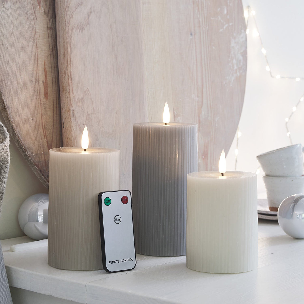 CA22008RC_TruGlow-Grey-Ribbed-LED-Pillar-Candle-Trio-Remote-Christmas_1.jpg