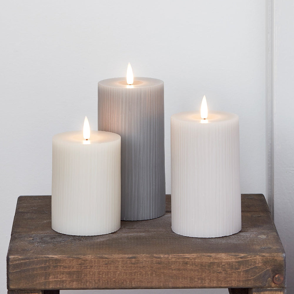 CA22008_TruGlow_-Grey-Ribbed-LED-Pillar-Candle-Trio.jpg