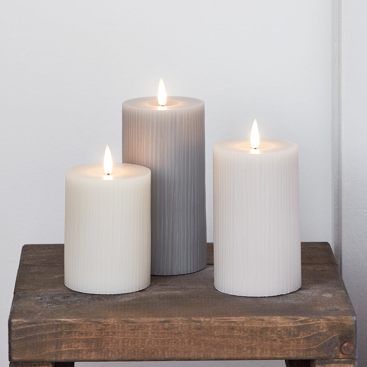 CA22008_TruGlow_-Grey-Ribbed-LED-Pillar-Candle-Trio.jpg