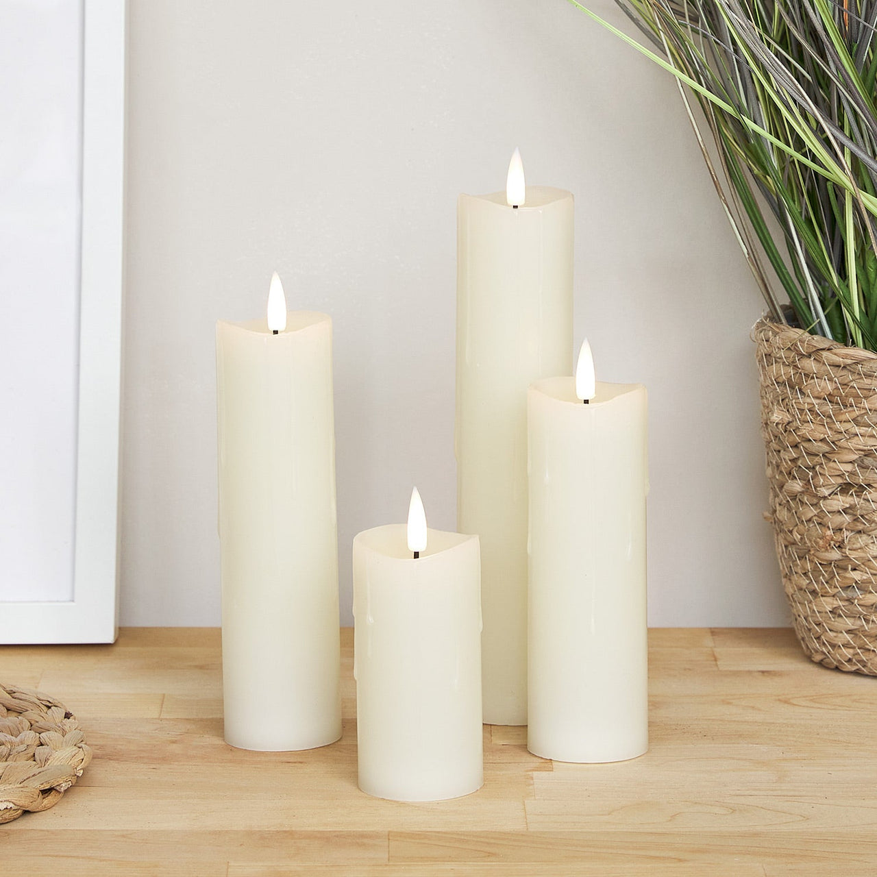 CA22012_4-TruGlow_-Dripping-Wax-LED-Slim-Pillar-Candles.jpg