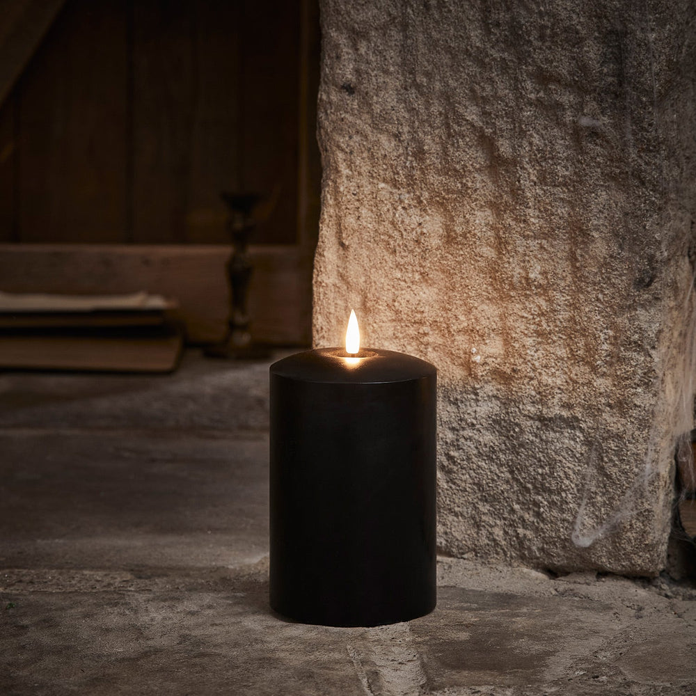 CA22047_TruGlow_-Black-LED-Chapel-Candle-15cm.jpg