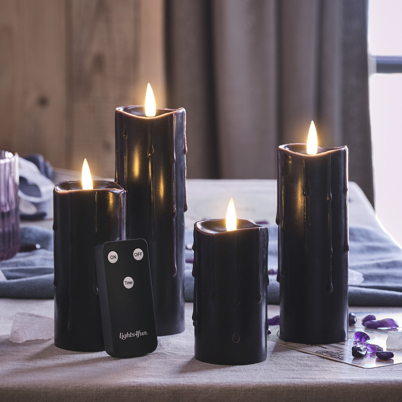 4 TruGlow® Black Dripping Wax LED Slim Pillar Candles