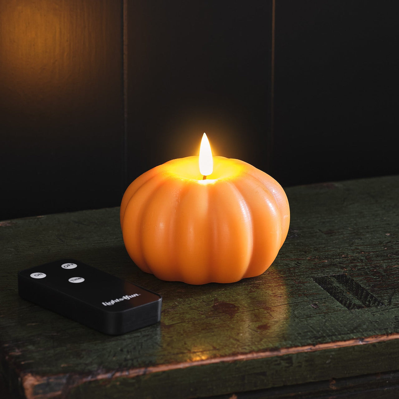 CA24038_2_-RealWaxTruGlow_OrangePumpkinCandle.jpg