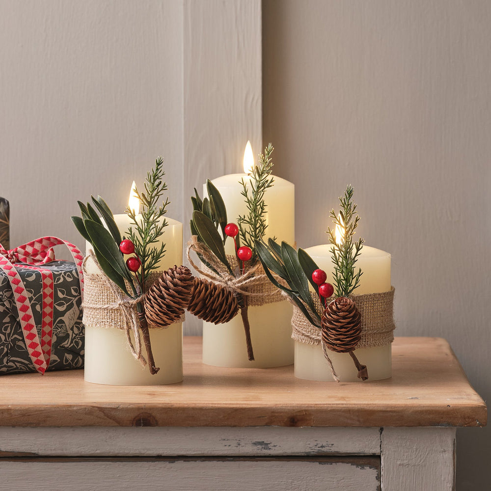 CA24042-Setof3WinterFoliageWrappedTruGlowLEDPillarCandles.jpg