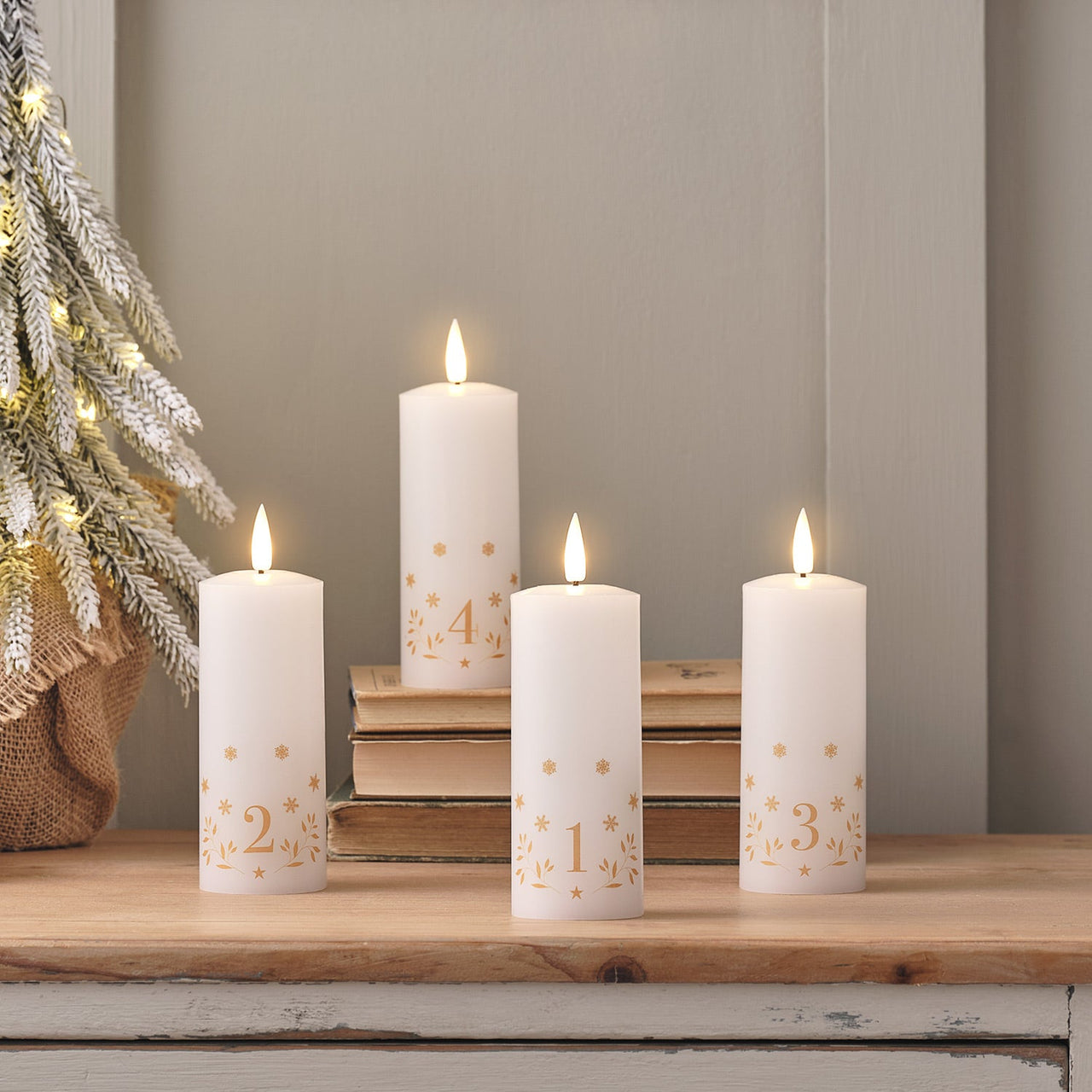 CA24045-Setof4AdventNumbersTruGlowLEDPillarCandles.jpg