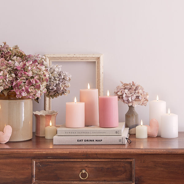 Close-up-pastel-dresser-decorations-pink-candles-floral_600x600_5f6dd9b8-76ac-4b45-b0ac-f67042db7f15.jpg