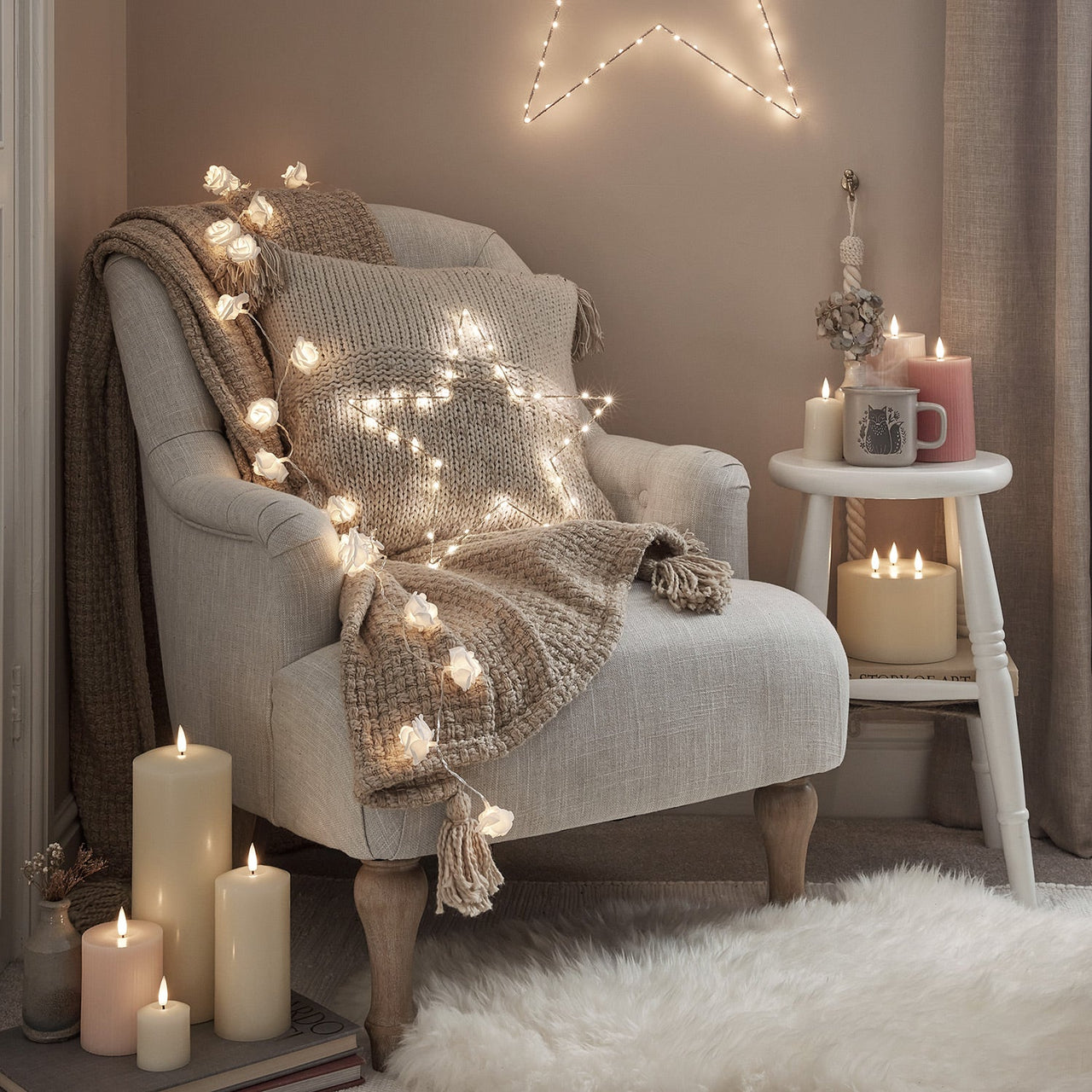 Cosy-armchair-fairy-lights-stars-led-candles.jpg