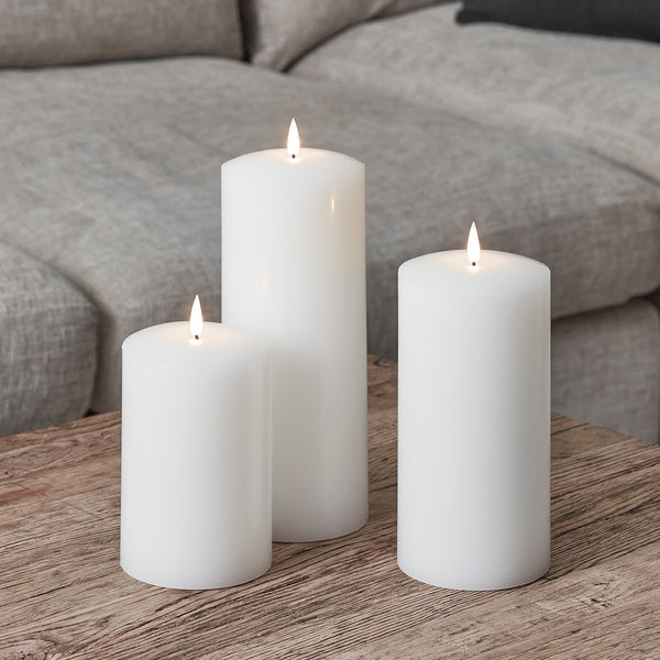 D-CA220345_TruGlow_-White-Chapel-Pillar-Candle-Trio_600x600_015d6797-1abe-42a9-ab28-71069b8f0e98.jpg