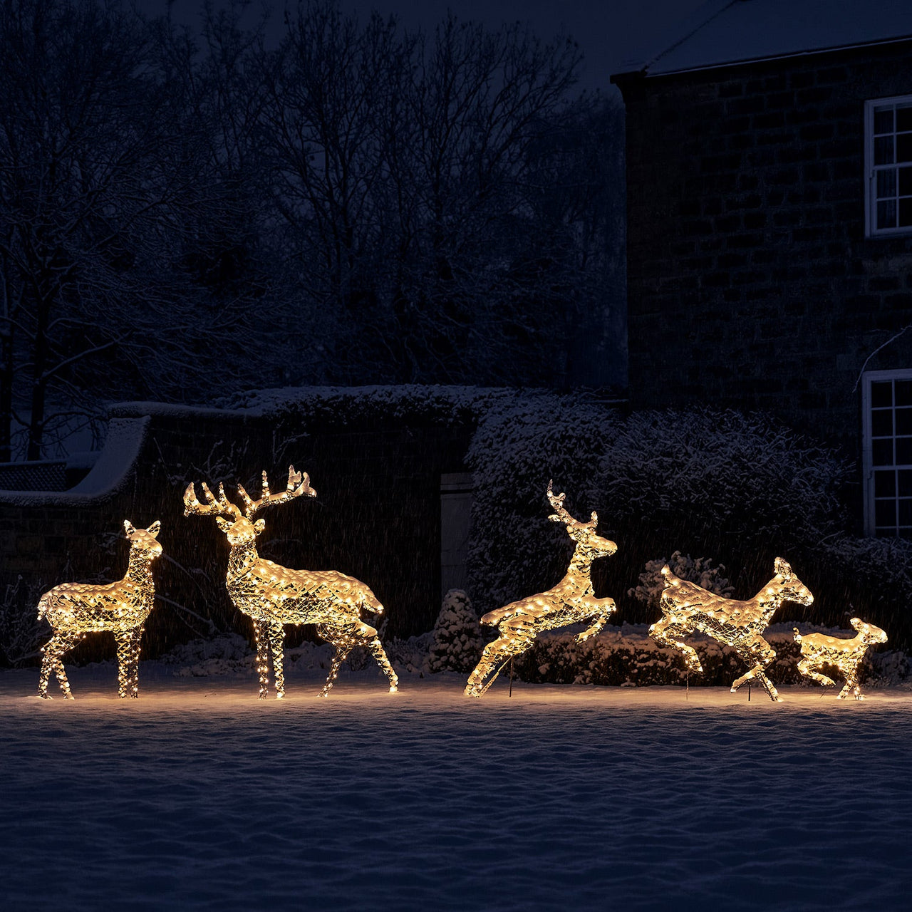 D-XX21023_Harlow-Rattan-3in1-Light-Up-Reindeer-Family-Snowy-Garden_1.jpg