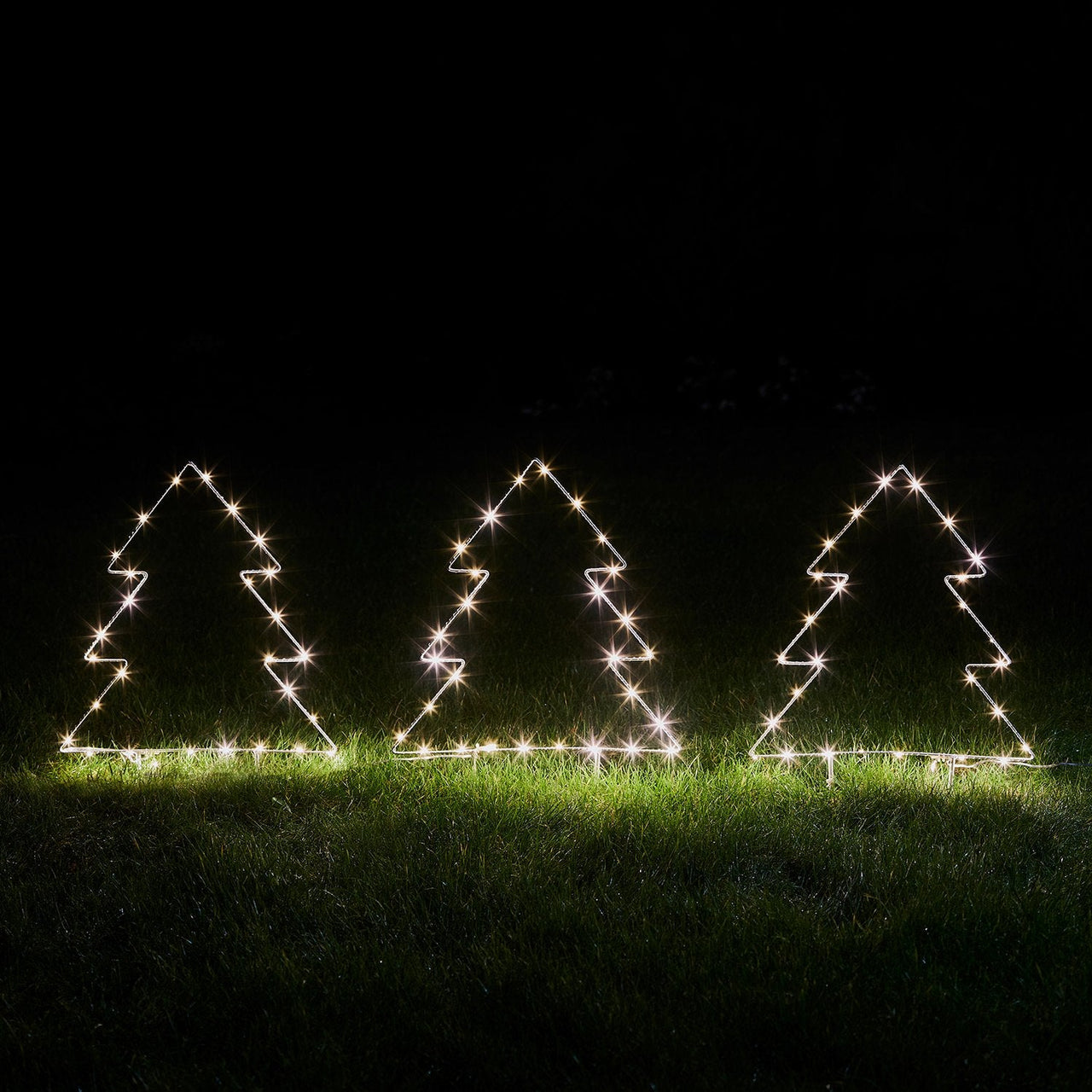 D3-LL20067_Outdoor-Christmas-Tree-Stake-Light-Trio-Garden_6b690b0d-dac0-456a-8653-a37288635cb7.jpg