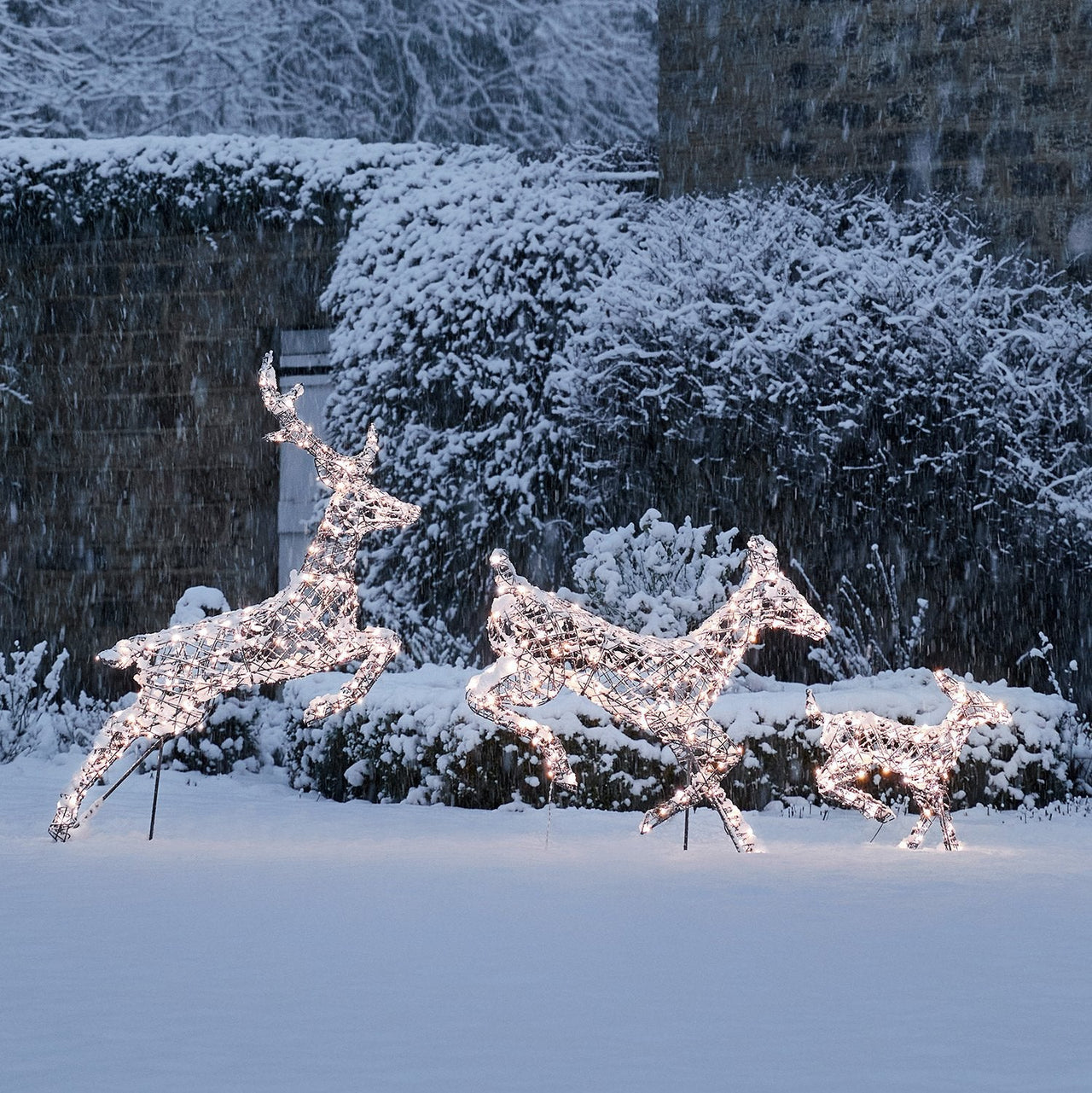 Harlow-Rattan-Reindeer-dual-White-set-of-three-snow.jpg