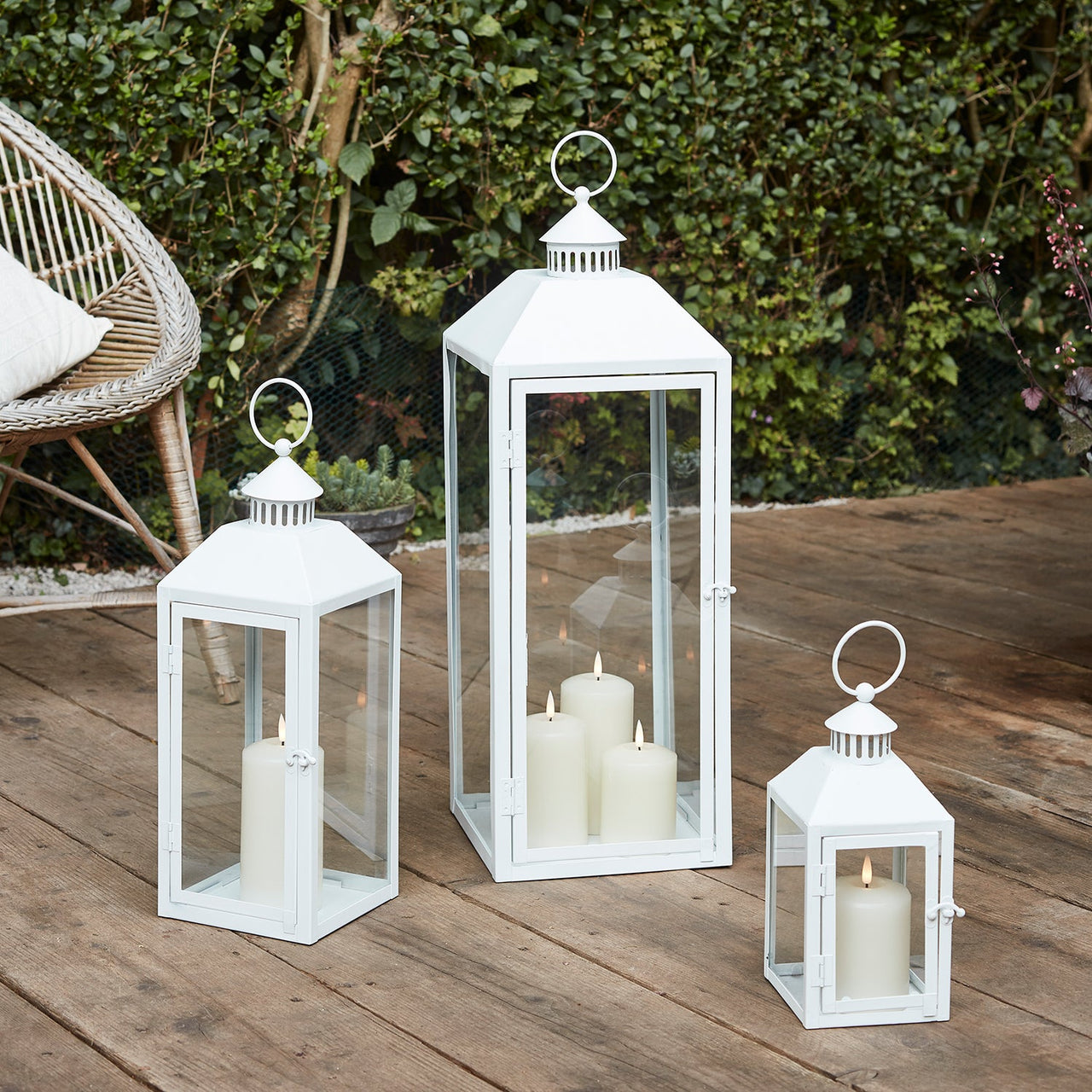 LA20014_white-metal-lanterns-trio-truglows-outdoor-p2.jpg