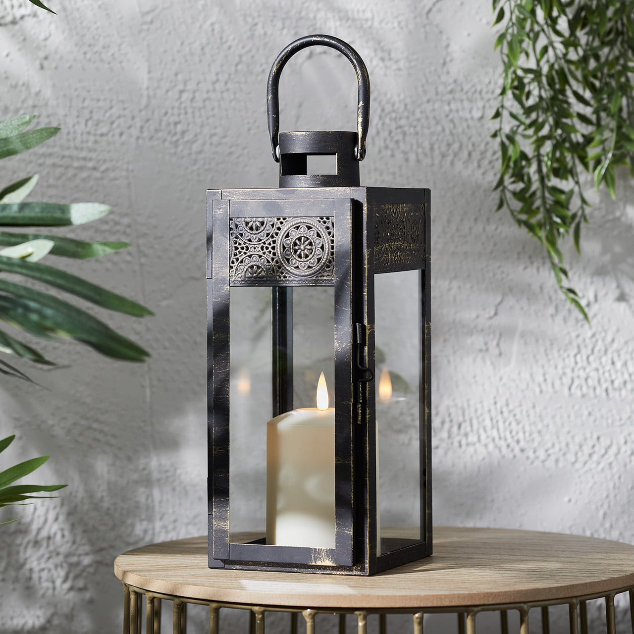 LA21004_Nador-Moroccan-Garden-Lantern-TruGlow-Candle-Illuminated-Table.jpg