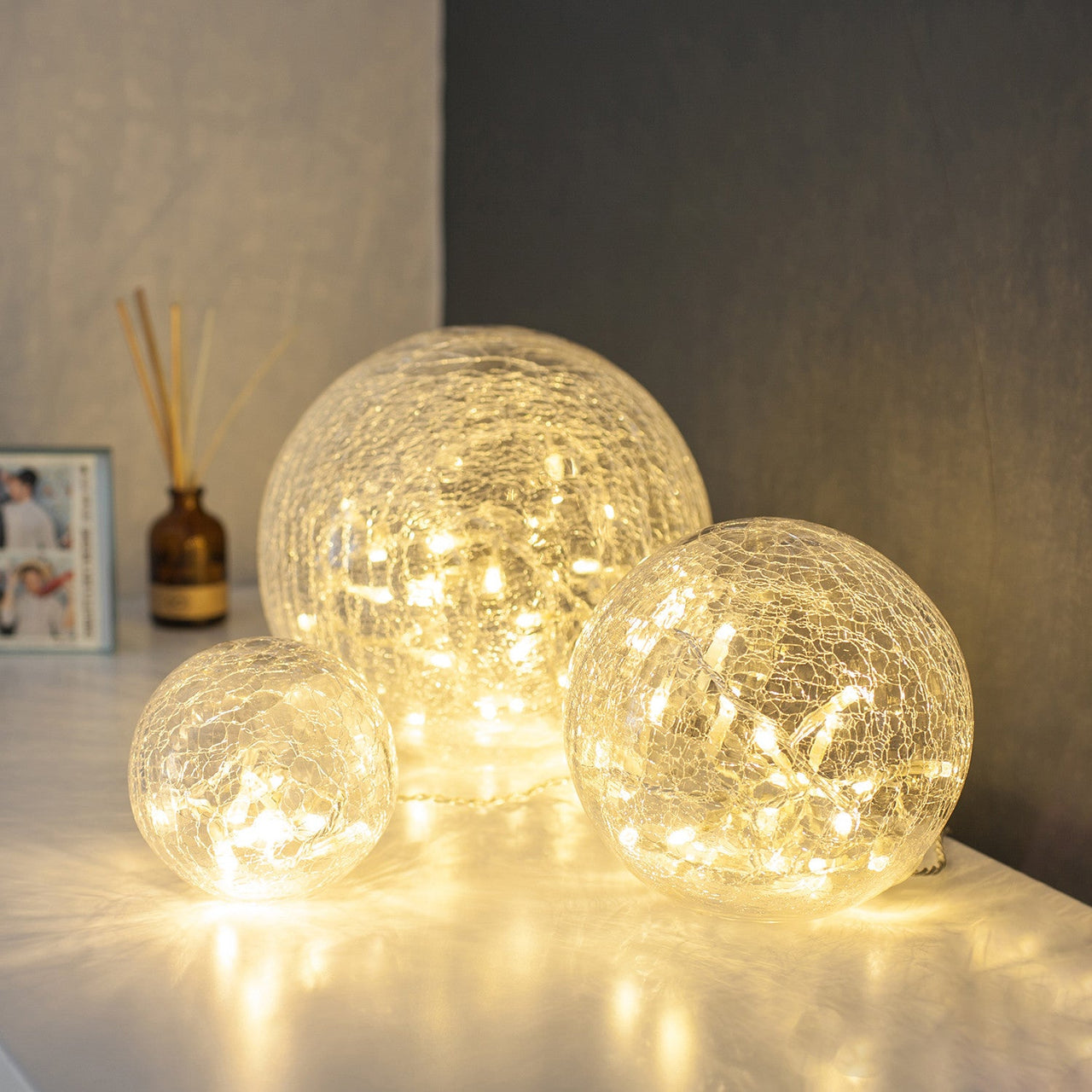 LL17037_Warm-White-Crackle-Glass-Orb-Lights-Shelf_P1.jpg