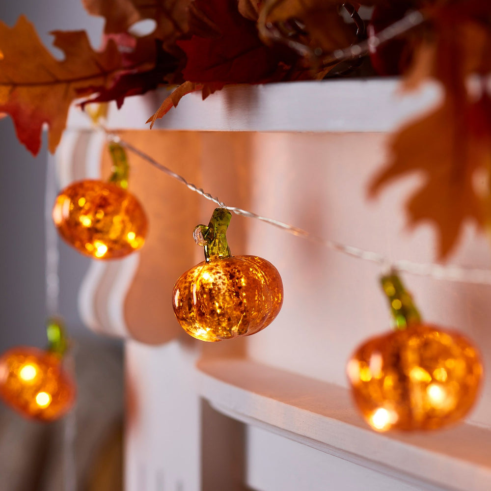 LL19051_10-LED-Glass-Pumpkin-String-Lights-On_P1.jpg