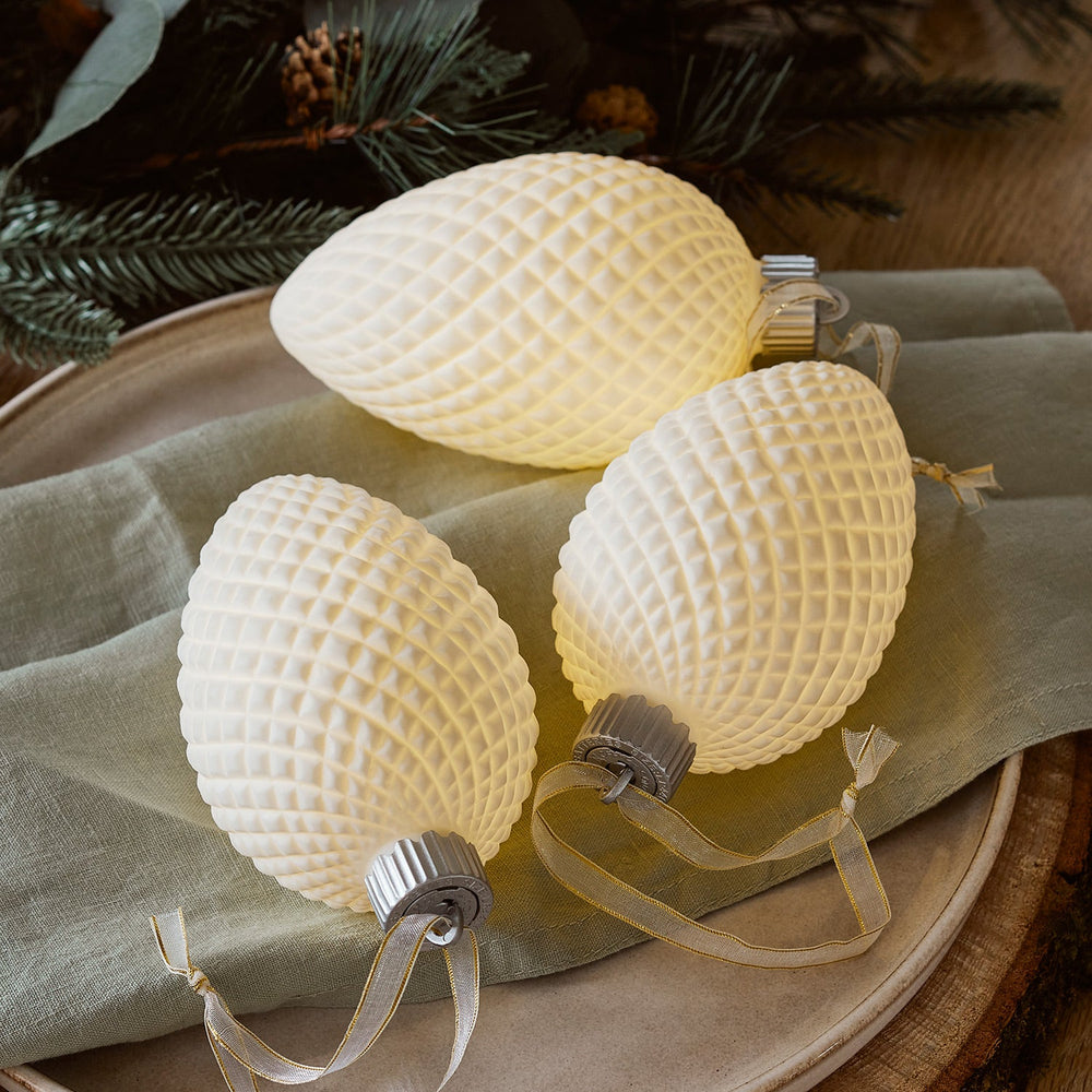 LL21106_Ceramic-Pinecone-LED-Christmas-Bauble-Trio-Table-Setting.jpg