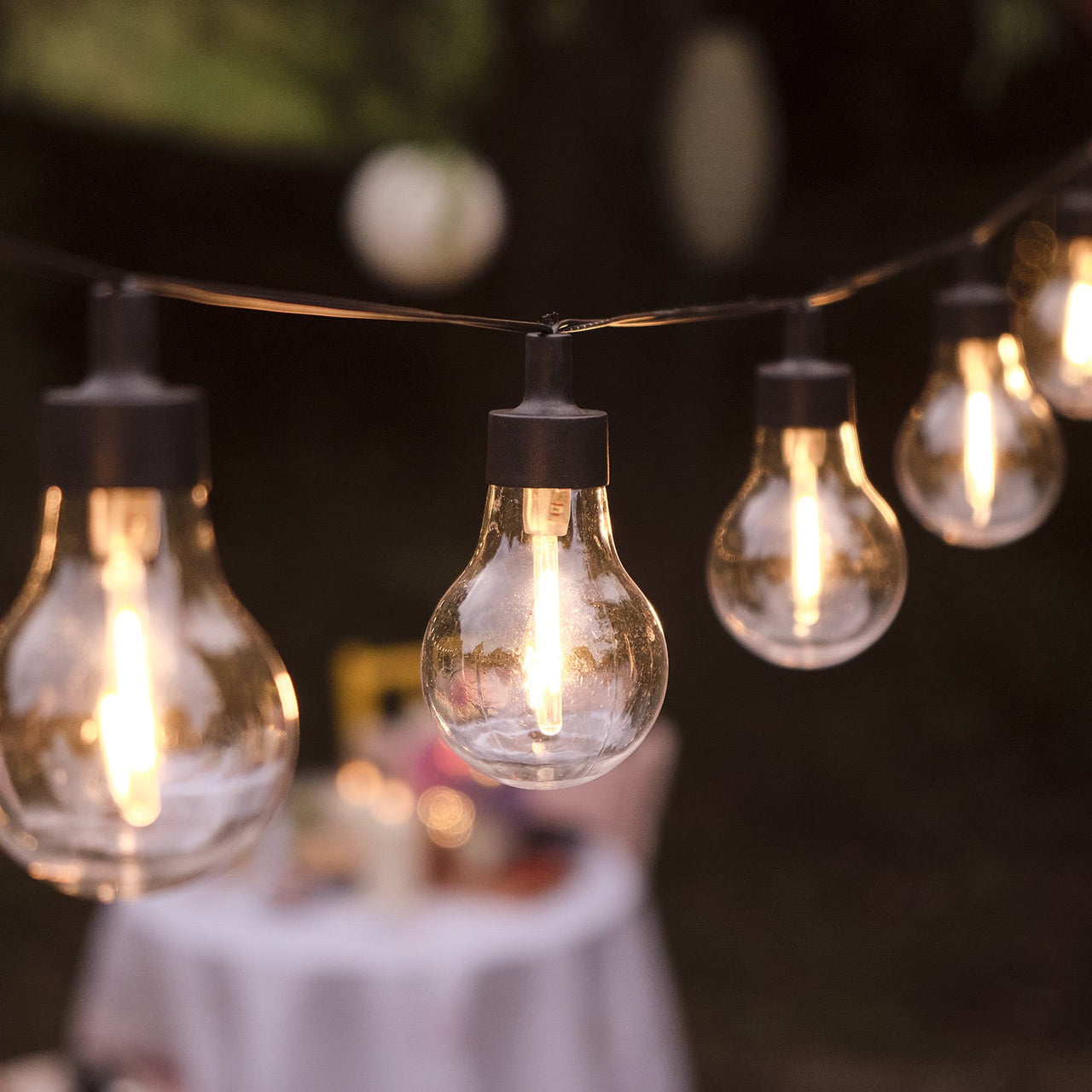 Night-garden-festoon-lights-solar-lanterns-truglow-candles.jpg