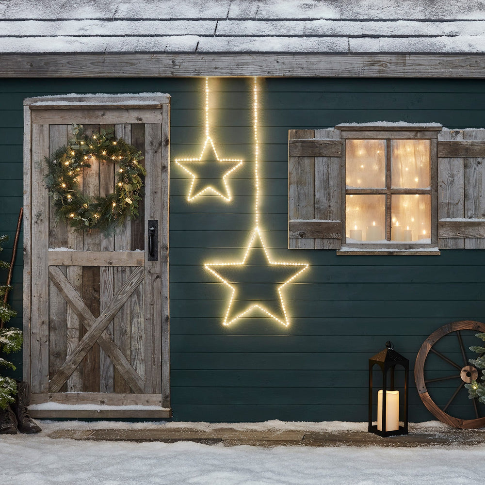 Outdoor-Christmas-LED-Hanging-Star-Lights-Cabin_2.jpg