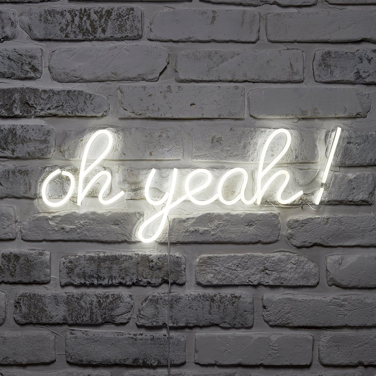 PL20002_oh-yeah-neon-sign-white-led-brick-wall-dark-p1.jpg