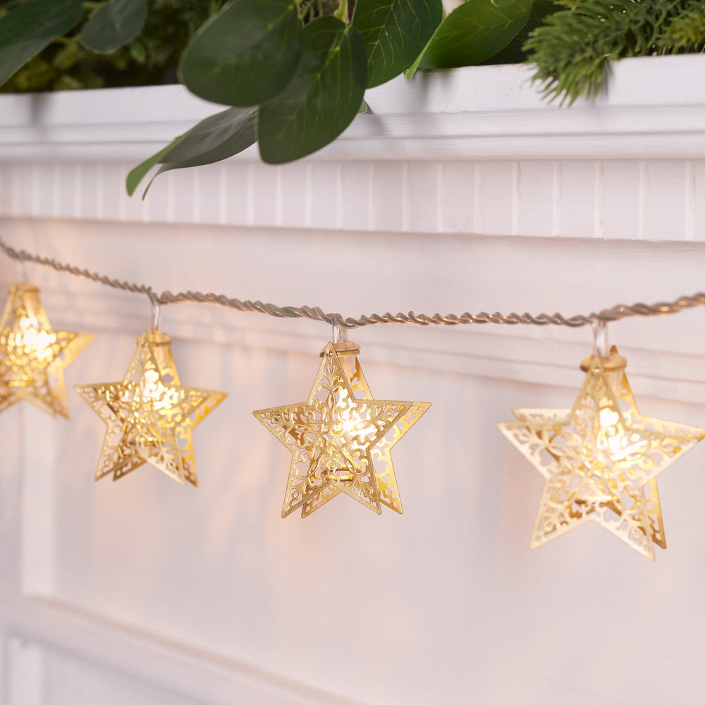 PL21073_16-Gold-Filigree-Star-Fairy-Lights-Mantle-On.jpg