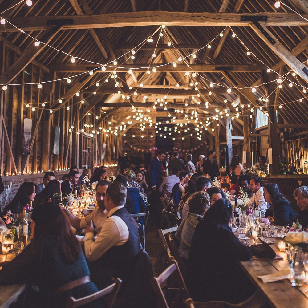 PR10YWW_Barn-wedding-reception-festoon-light-canopy-claire-penn_P5_11650391-6056-4f78-8127-959a7a1c4046.jpg