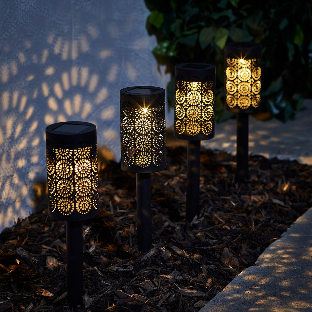 SL21007_4-Marrakesh-Moroccan-Solar-Stake-Lights-Lining-Garden-Pathway-Illuminated.jpg