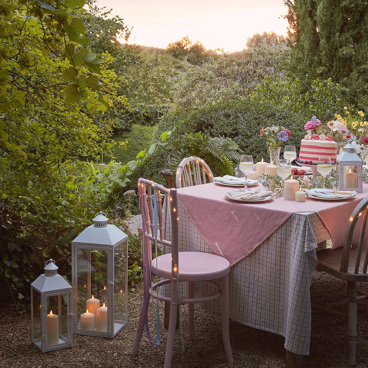 Tea-party-garland-pastel-lanterns-led-candles-table-chairs_9b3ebe10-0102-4d78-a09f-a3fd47e34c69.jpg