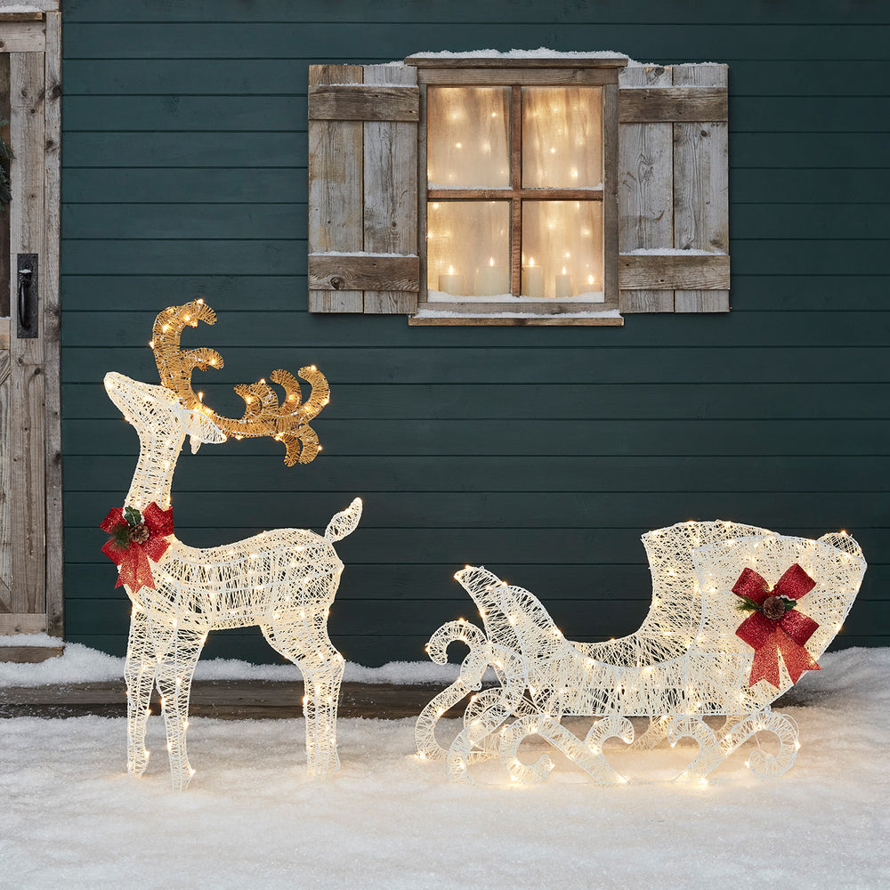 XX2005_4~Outdoor-Christmas-Figures-Light-Up-Reindeer-Sleigh-Cabin.jpg