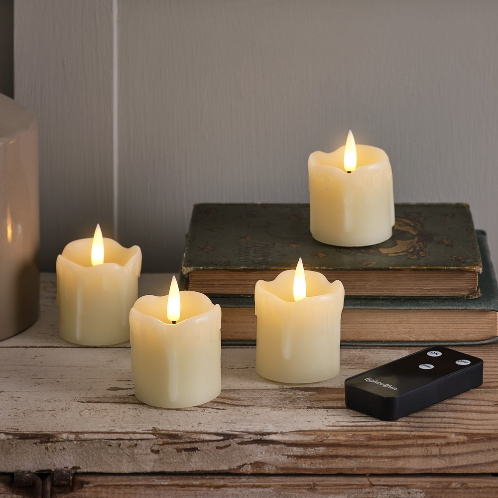 4 TruGlow® Dripping Wax LED Votive Candles