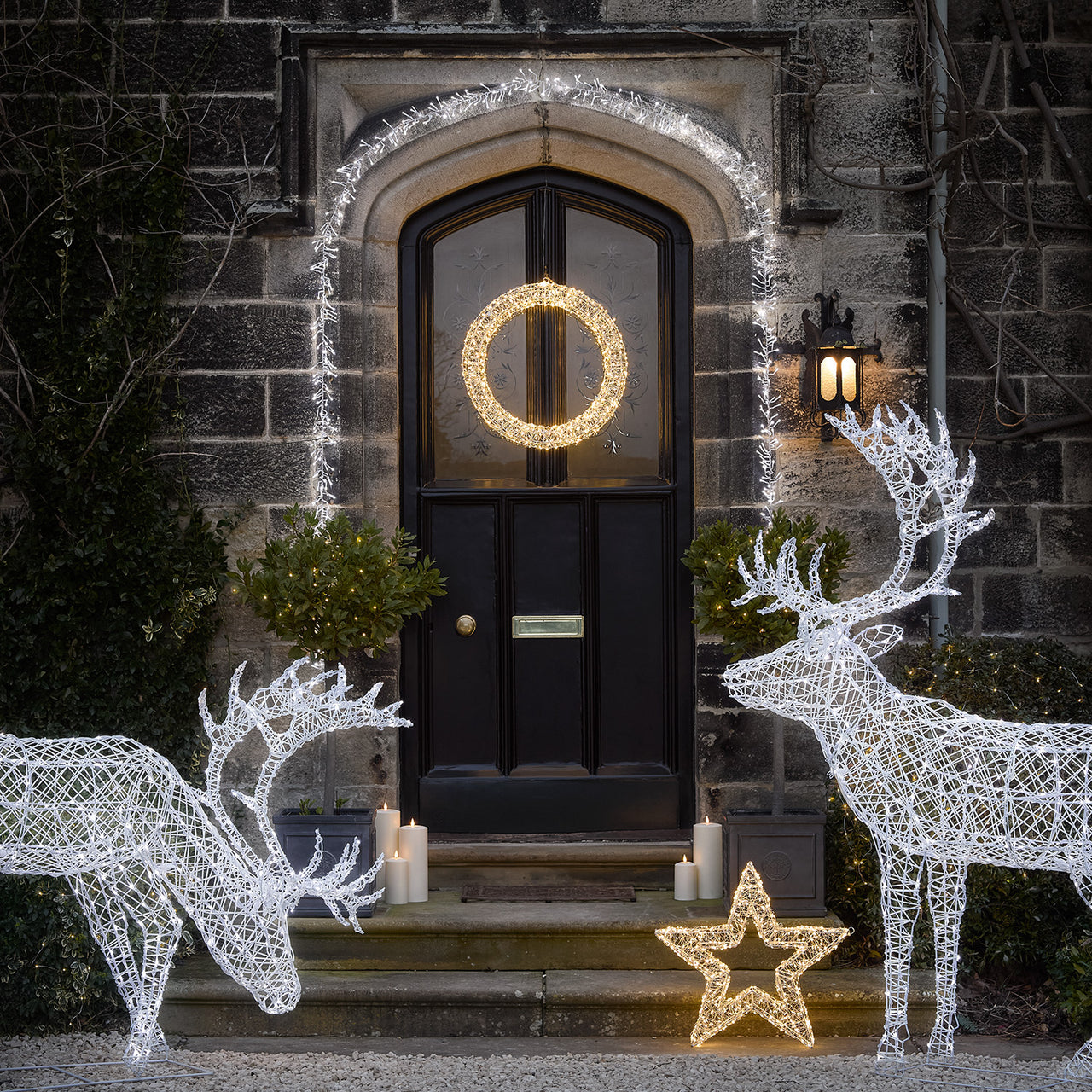 reindeer-wreath-garland-star-porchway-lanterns-candles.jpg