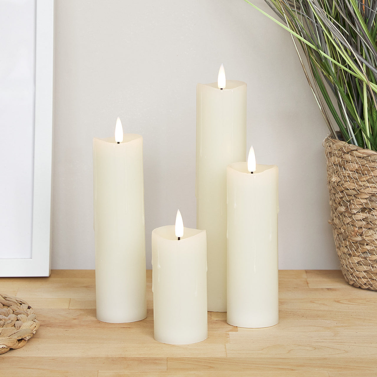 4 Ivory TruGlow® Dripping Wax LED Slim Pillar Candles –