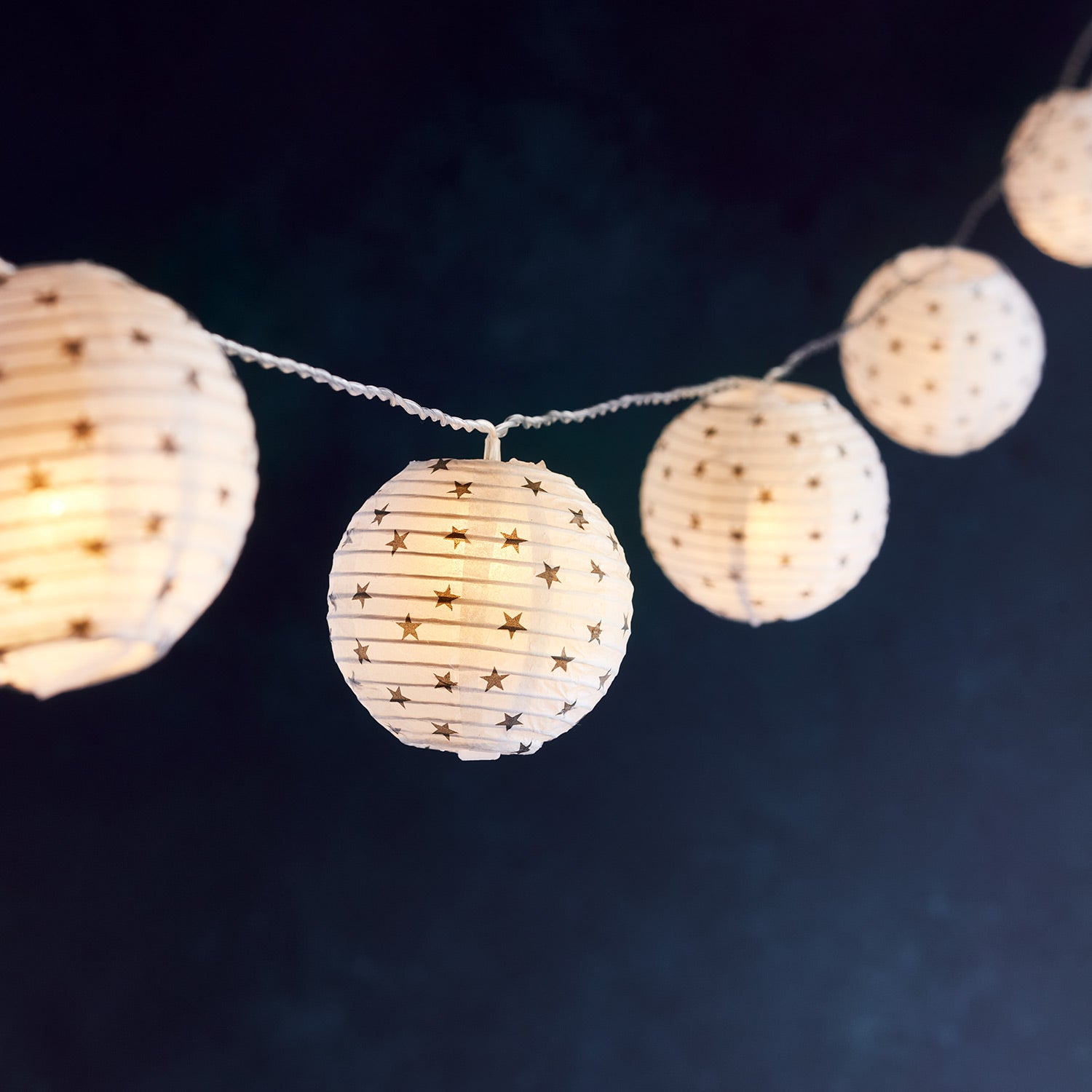 Small paper shop lanterns with lights