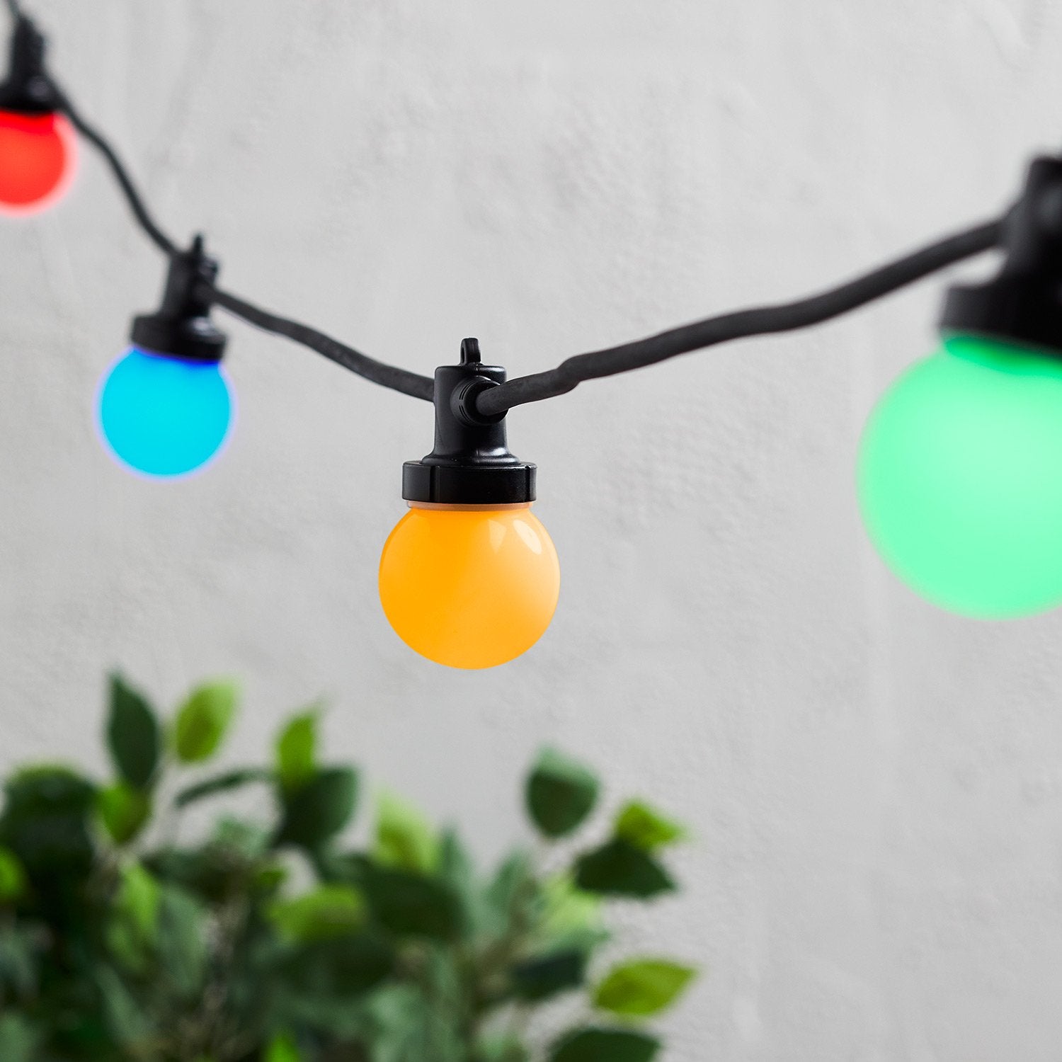 Multi coloured store festoon lights outdoor